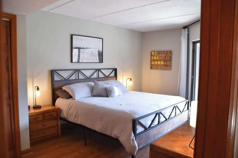 Master bedroom with access to spacious back deck.