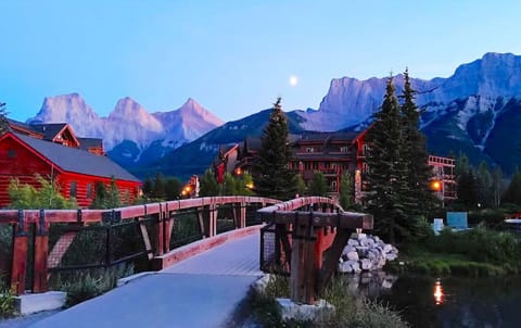Spring Creek with three-sisters Mountains in the background 