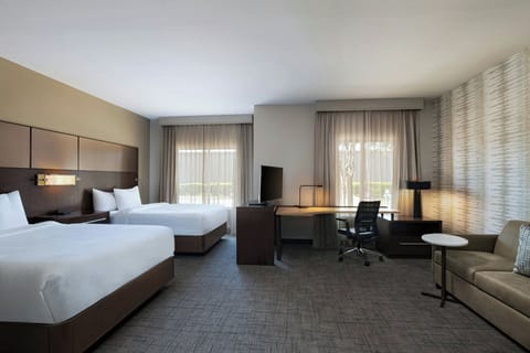 Premium bedding, desk, iron/ironing board, free cribs/infant beds