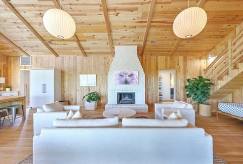 Elegant living space with a charming fireplace, perfect for cozy evenings.