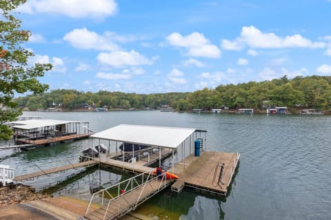 Dock life is where it's at! Enjoy the swim mat, kayak, and easy access swim ladders
