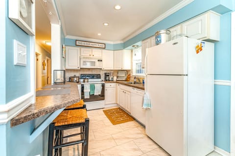 Kitchen area with modern amenities
