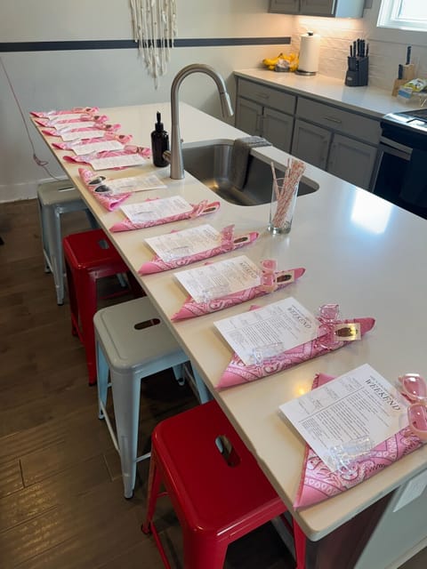 The expansive kitchen island is the perfect staging ground for welcome bags, itineraries, and party favors to greet your guests upon arrival.