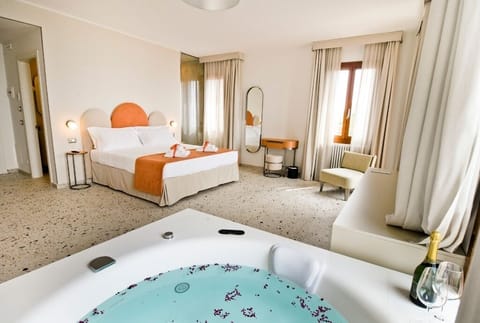 Luxury Room, Jetted Tub (Verbena) | Down comforters, minibar, in-room safe, blackout drapes