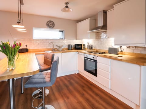 Fridge, electric kettle, toaster, cookware/dishes/utensils