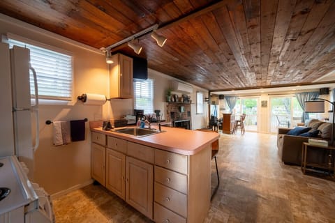 First Floor Open Floor Plan with Queen Sleeper Sofa and A/C Unit