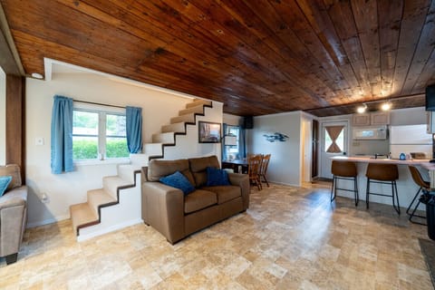 First Floor Open Floor Plan with Queen Sleeper Sofa and A/C Unit