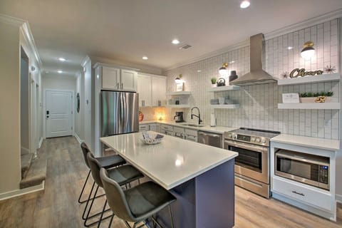 Cook up your favorite meals in a fully stocked, modern kitchen with sleek finishes