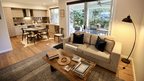 Open plan kitchen and living area with gas fireplace
