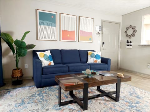 Living room, with a queen pull out couch.