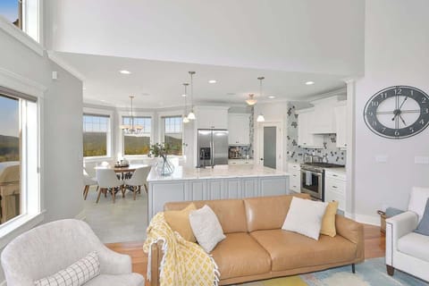 Fully equipped modern kitchen with amazing views on the main floor.