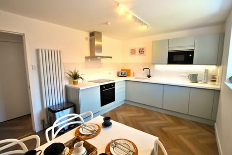 The modern kitchen spacious and well equipped.