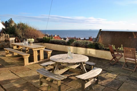 The patio is designed to make the most of the sea views and sunsets