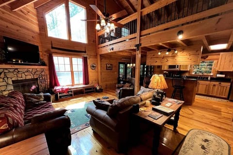 Enjoy lounging in the open living room with Direct TV & Streaming