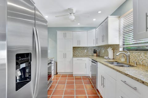 Unit 1 - Out Kitchen Features a Newly Renovated Kitchen With Stainless Appliances