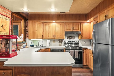 Kitchen with lights, full complement of utensils,dishes, cups and glassware