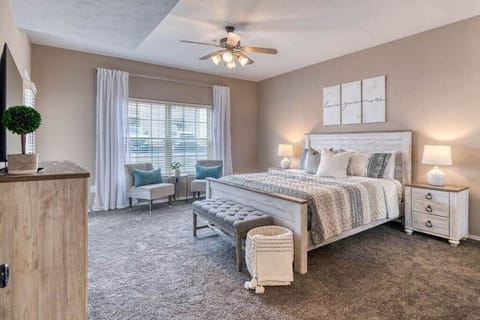 The primary bedroom features a king bed and lots of extra space!
