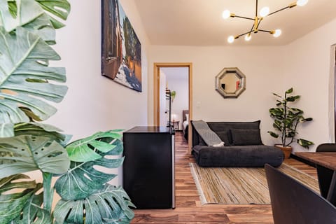Deluxe Apartment | Living area | Smart TV