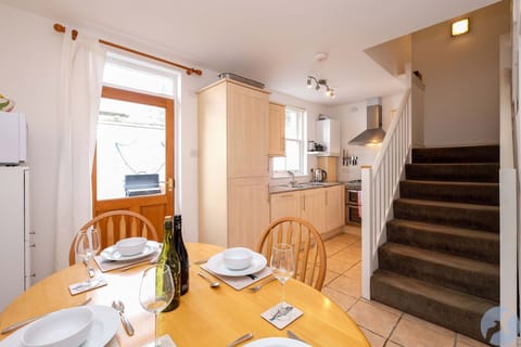 The kitchen is compact but fully equipped including dishwasher