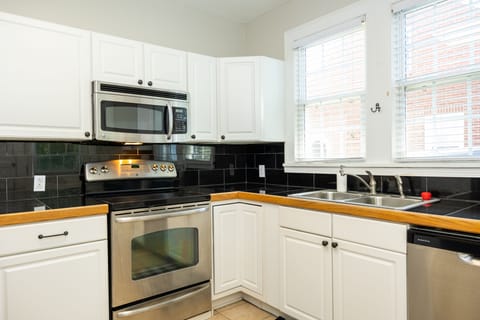 Fully equipped kitchen for family meals or game day snacks