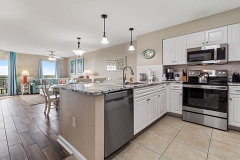 Your spacious kitchen flows seamlessly into the living area, perfect for cooking and entertaining together.