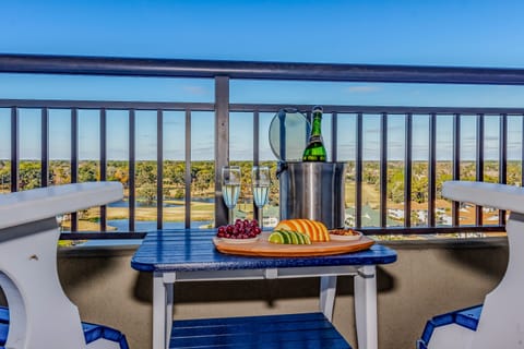 Sip champagne on your private balcony while taking in sweeping views of the landscape below.