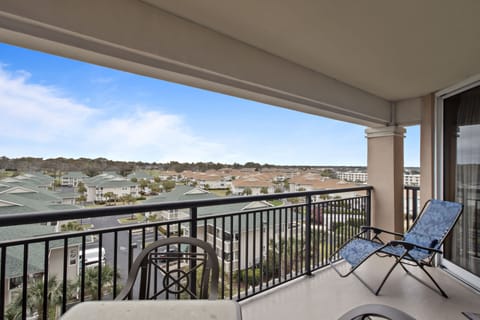 Step onto your private balcony and soak in the sweeping neighborhood views stretching to the horizon.
