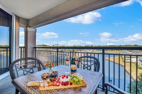 Savor champagne and gourmet treats on your private balcony while taking in sweeping lake views and blue skies.