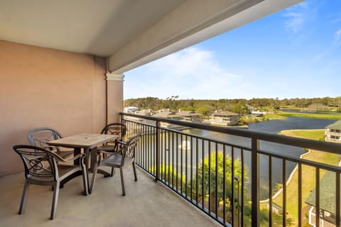 Sip your morning coffee while enjoying stunning water and golf course views from your private balcony oasis.