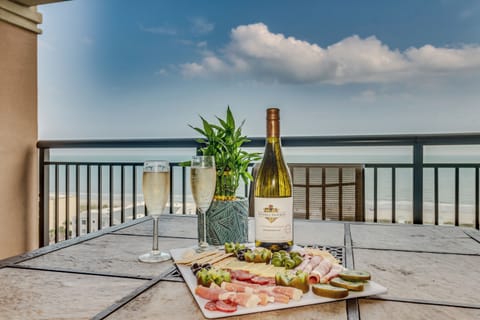Savor wine and appetizers on your private balcony while soaking in breathtaking ocean views and gentle sea breezes.