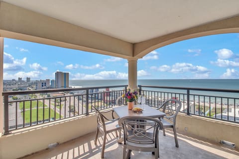 Sip your morning coffee while taking in spectacular ocean views from your private covered balcony, perfectly furnished for relaxing moments.
