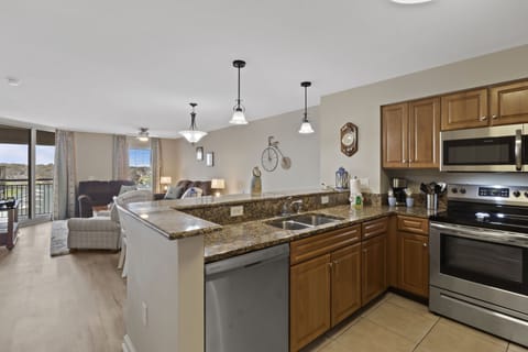 Your open kitchen flows into the living area, perfect for cooking while staying connected with everyone.