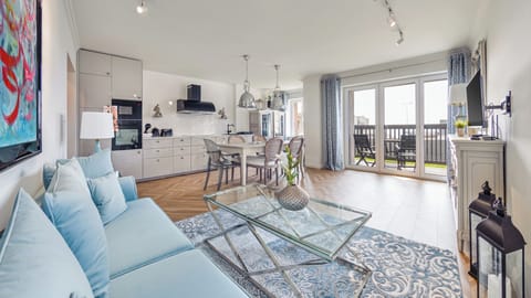 Apartment (ul. Wiejska 58/4) | Living area | Flat-screen TV