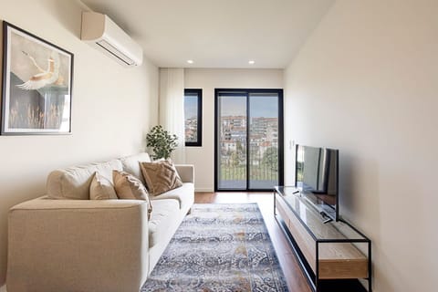 Our spacious living area invites relaxation with comfortable seating and a smart TV for cozy movie nights.
#LivingRoom #ComfortableStay #LovelyStay