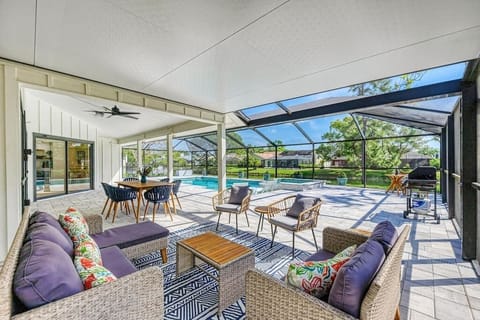 Relax and unwind in the covered seating area with comfortable outdoor furniture and a dining table with seating for 6!