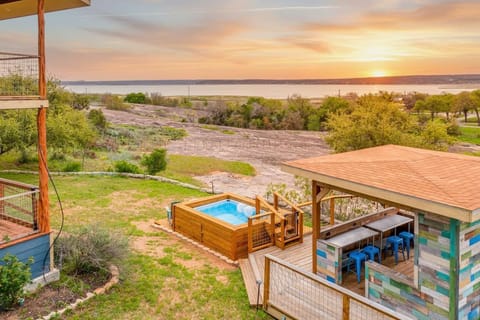 Cool off in the small plunge pool with attached Cabana and 180 degree views from the hill of Lake Buchanan! Cabana has seating, fire pit, lighting / fan, shade. 