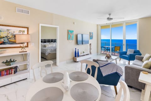 Unwind in your bright oceanfront living space with stunning sea views and modern coastal comfort.