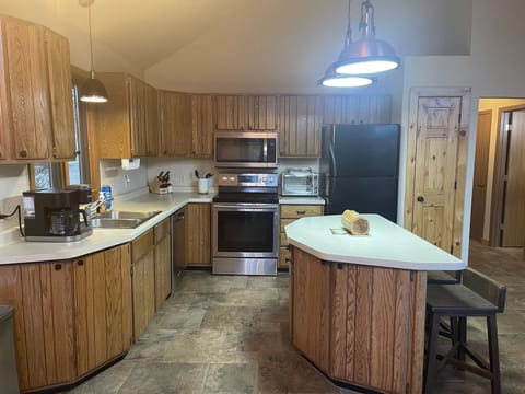 Fully stocked Kitchen with pod/pot coffee maker and convection toaster oven.