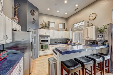 Kitchen peninsula with seating for four.