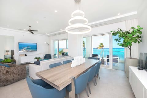 Welcome to #201 at the Rum Point Resort. This second floor condo spans 2,829 sq. ft. with 2 oceanfront suites, and 2 guest suites. 