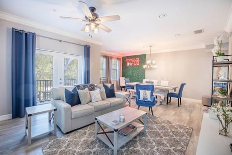 Living room and dining area with bar