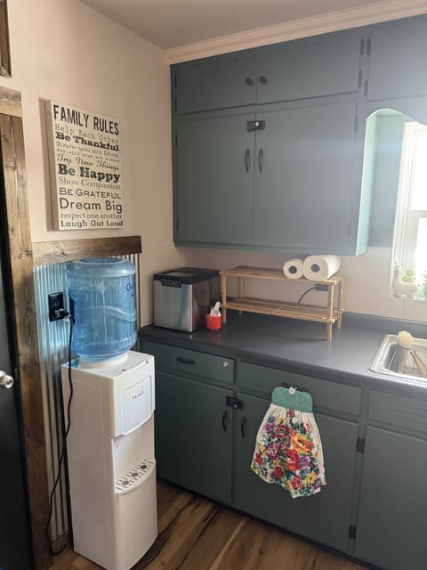 Water Dispenser & Ice Machine. Please only use bottled water in ice machine.