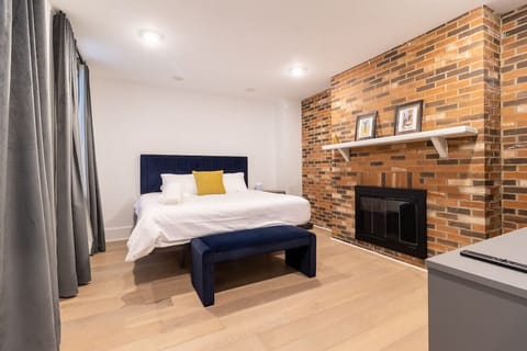 Cozy Modern Bedroom with Brick Accent Wall