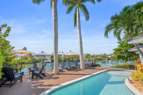 Sparkling pool steps from the water