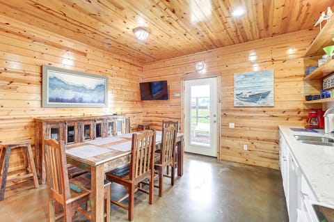 Interior - Enormous eat-in kitchen with mounted television. The perfect place for cooking and gathering.