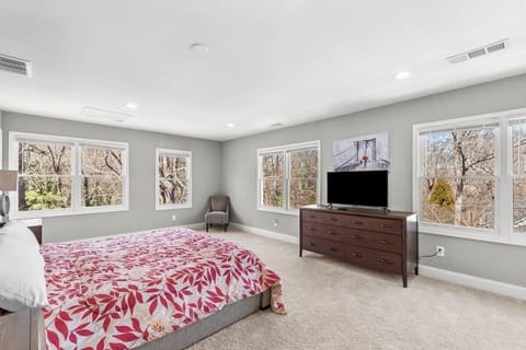 Second Master Bedroom  with California King bed on third floor of house.
