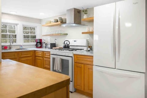 A modern layout with updated appliances makes cooking feel simple and stress-free. 