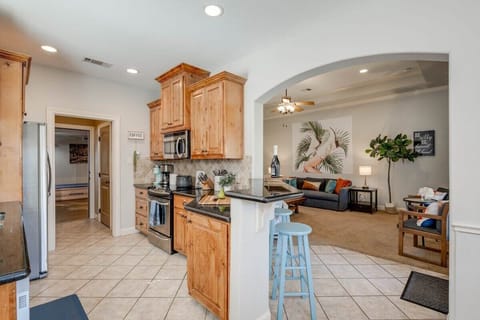 Kitchen opens up to the dining room & bar area off the living room. Coffee bar with Keurig & drip coffee maker (BYOC). We provide a fully stocked kitchen with all the basics to cook a basic meal.