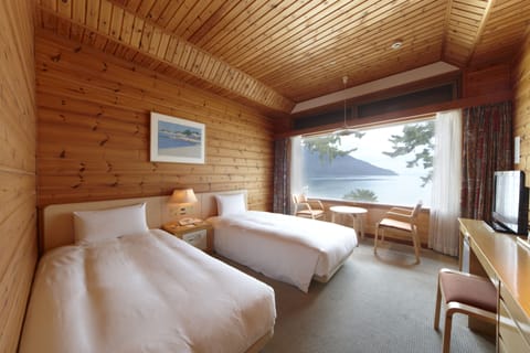 Basic Twin Room | Premium bedding, in-room safe, blackout drapes, iron/ironing board