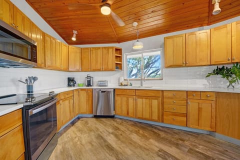 Experience culinary freedom in your spacious kitchen: where style meets functionality, creating a perfect haven for cooking and entertaining